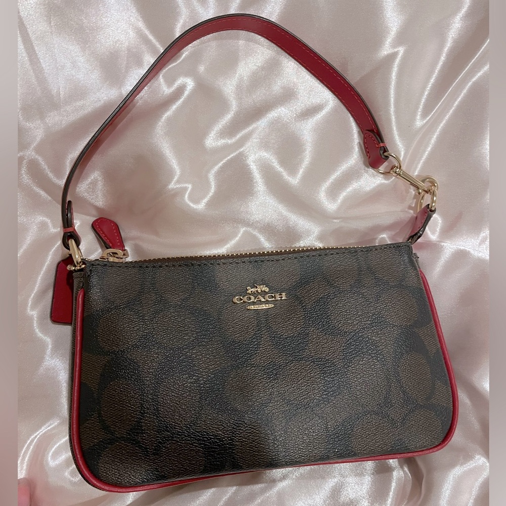 Coach Nolita 19 in signature canvas